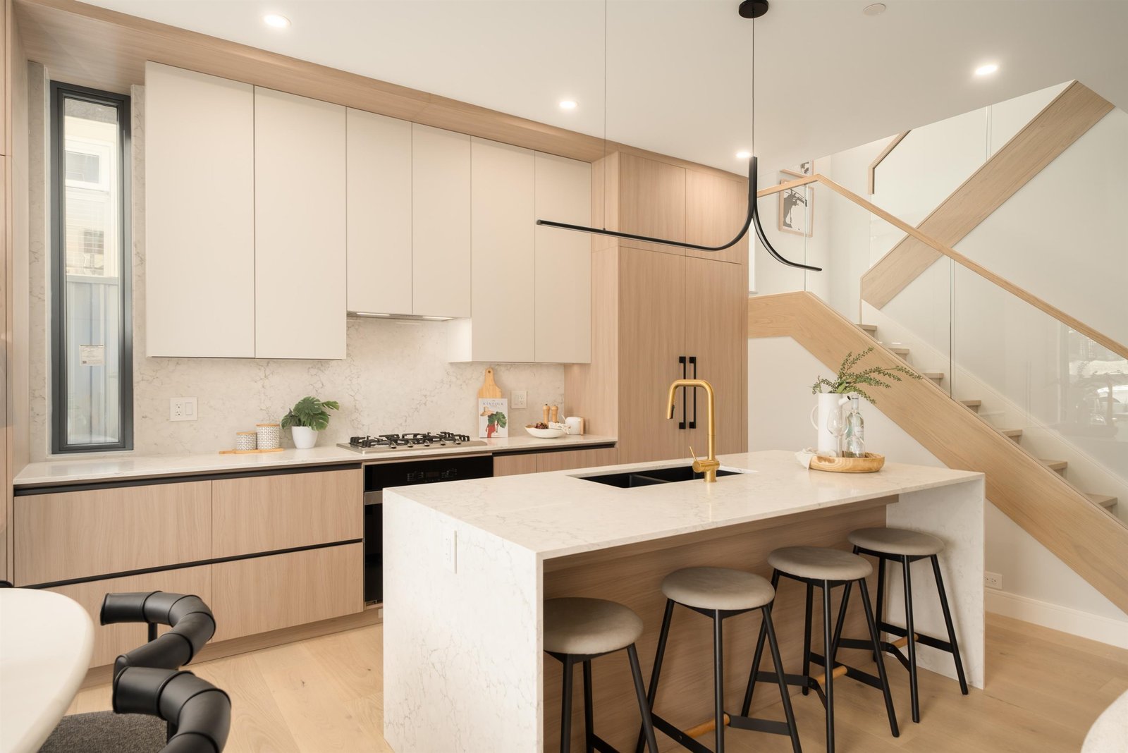 Kitchen island with bar seating at 1-2941 W 29th Ave, Mackenzie Heights, Vancouver