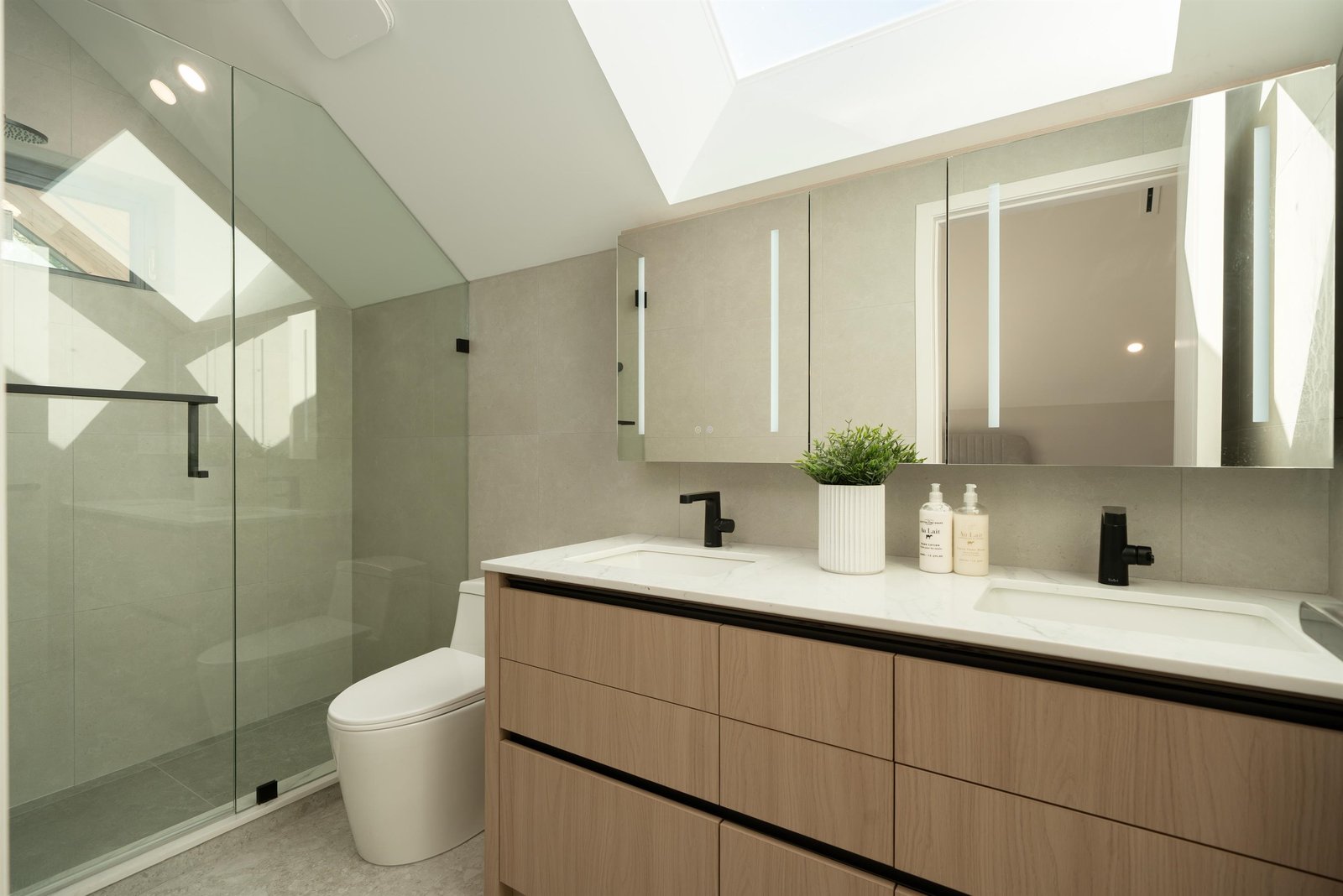 Upper bathroom with skylight at 1-2941 W 29th Ave, Mackenzie Heights, Vancouver