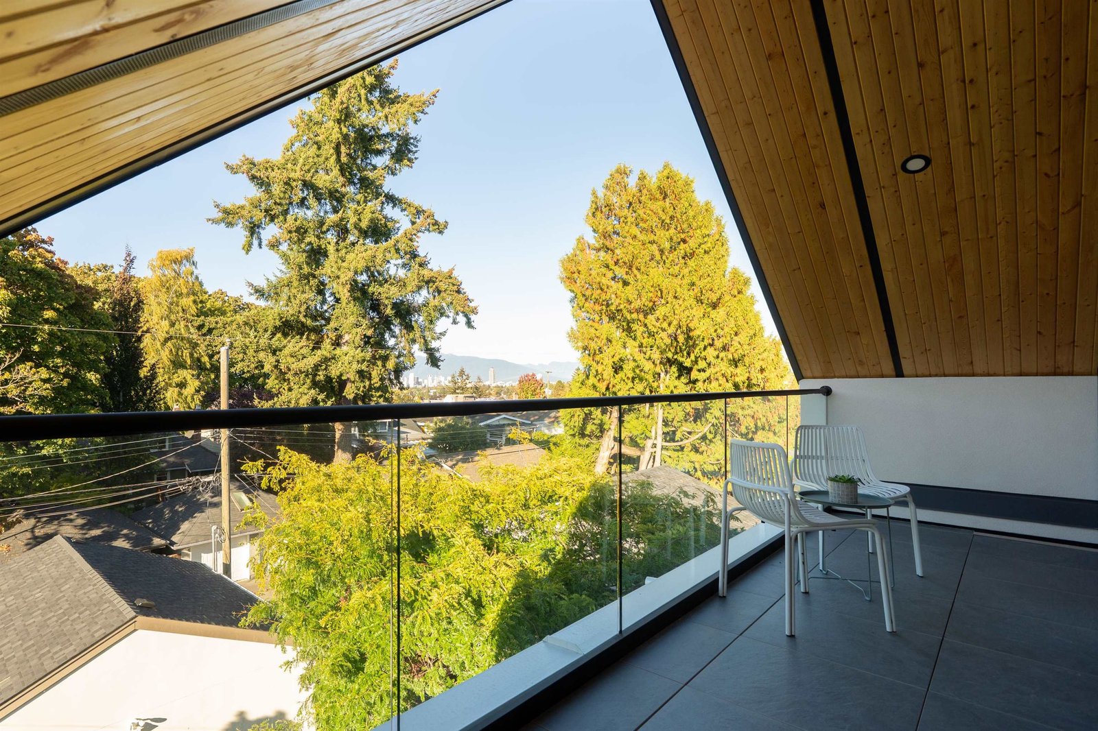 Balcony with city and mountain views at 2-2941 W 29th Ave, Mackenzie Heights, Vancouver