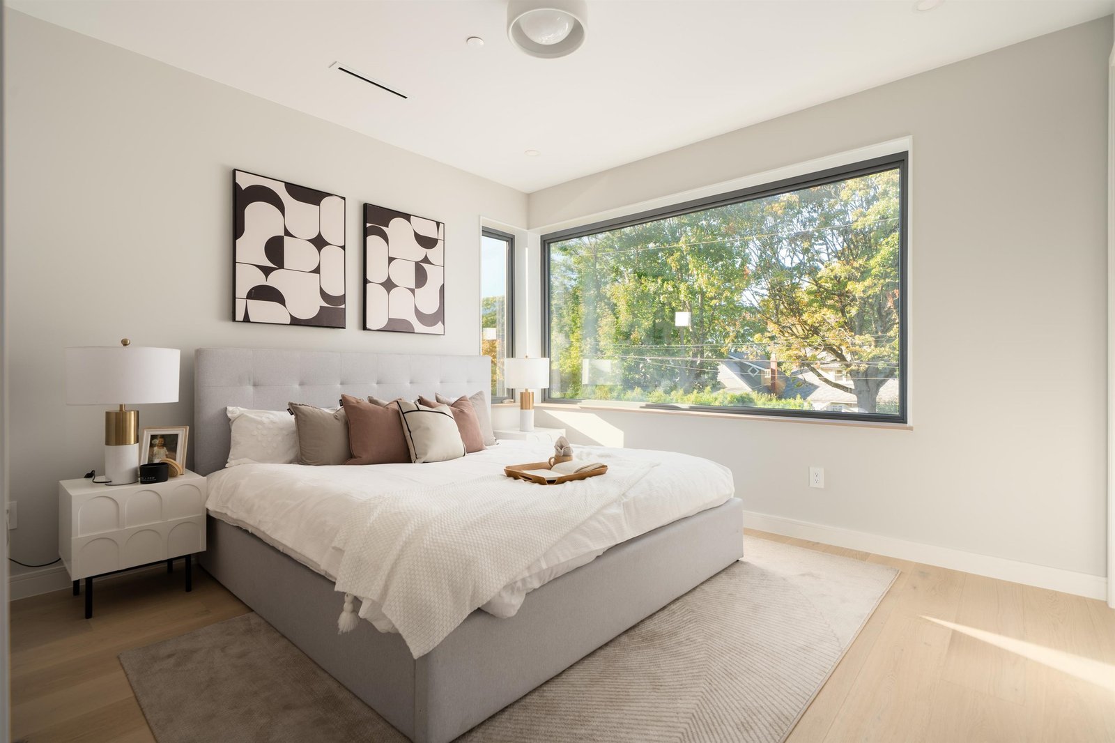 Primary bedroom with large window at 2-2941 W 29th Ave, Mackenzie Heights, Vancouver