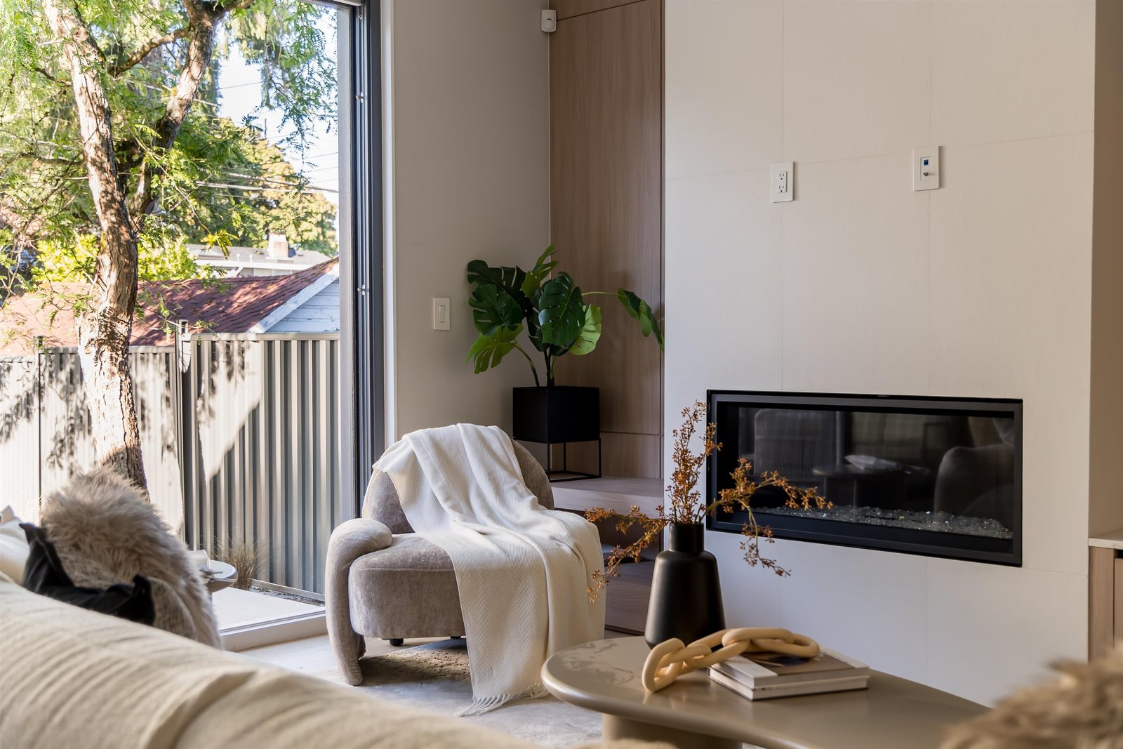 Living room with armchairs and fireplace at 2-2941 W 29th Ave, Mackenzie Heights, Vancouver