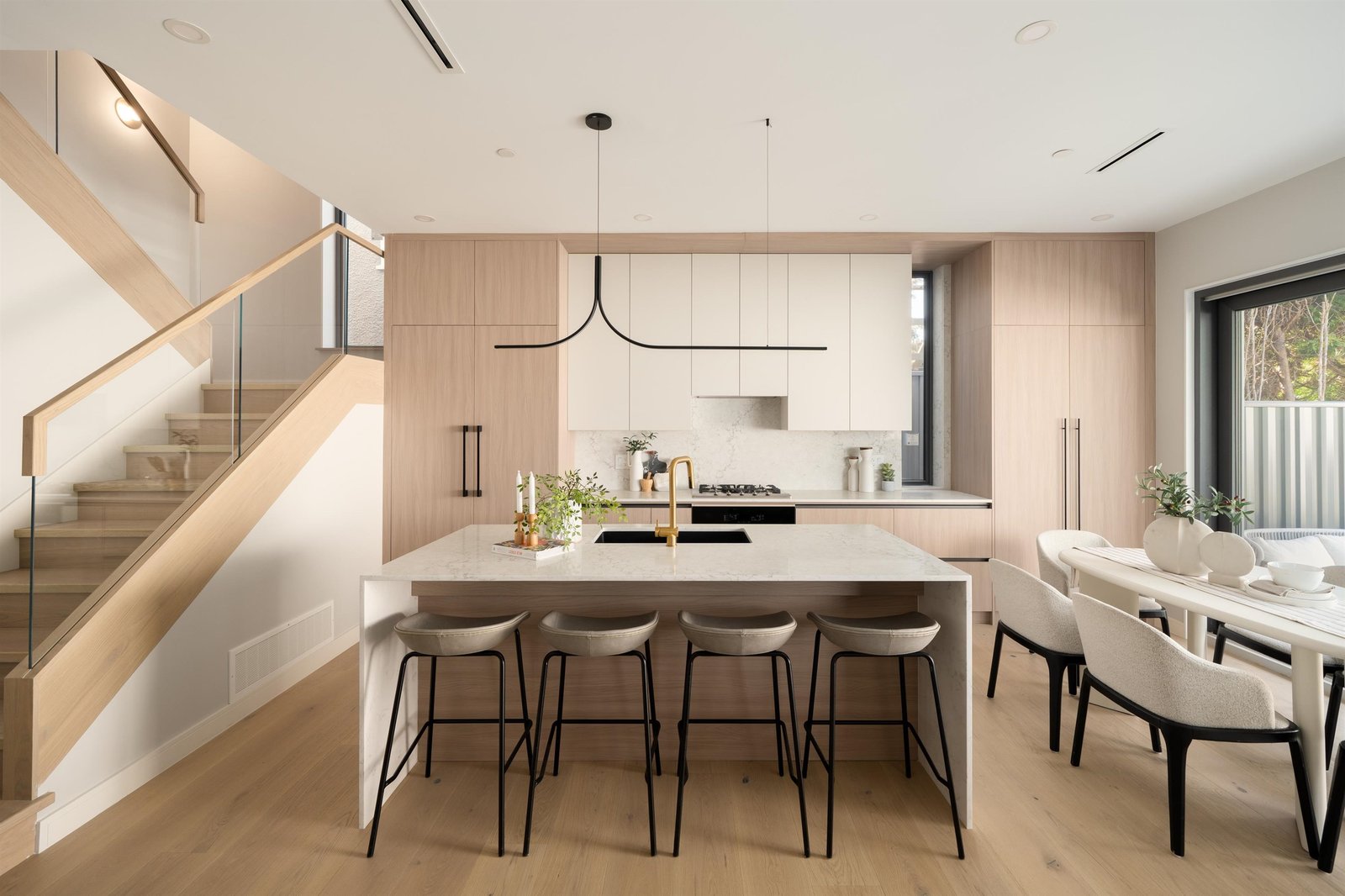 Dining area and kitchen island at 2-2941 W 29th Ave, Mackenzie Heights, Vancouver