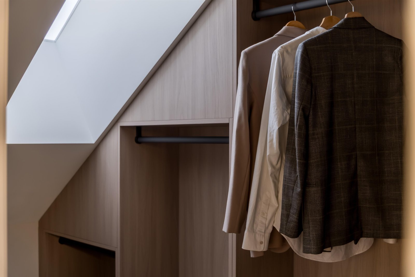 Sloped-ceiling closet cabinetry at 2-2941 W 29th Ave, Mackenzie Heights, Vancouver