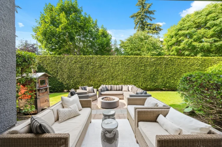A sunny backyard patio of a newly purchased home in Greater Vancouver